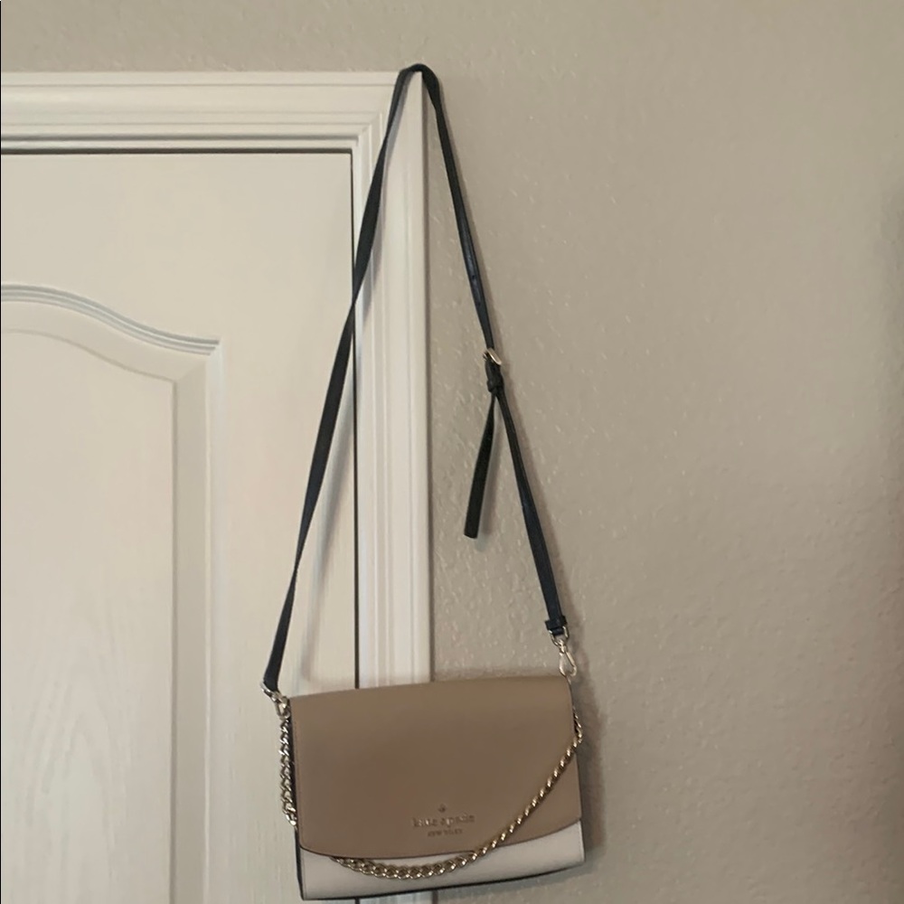 Kate Spade Tan and Black Crossbody Bag with Flap Closure and Adjustable Strap